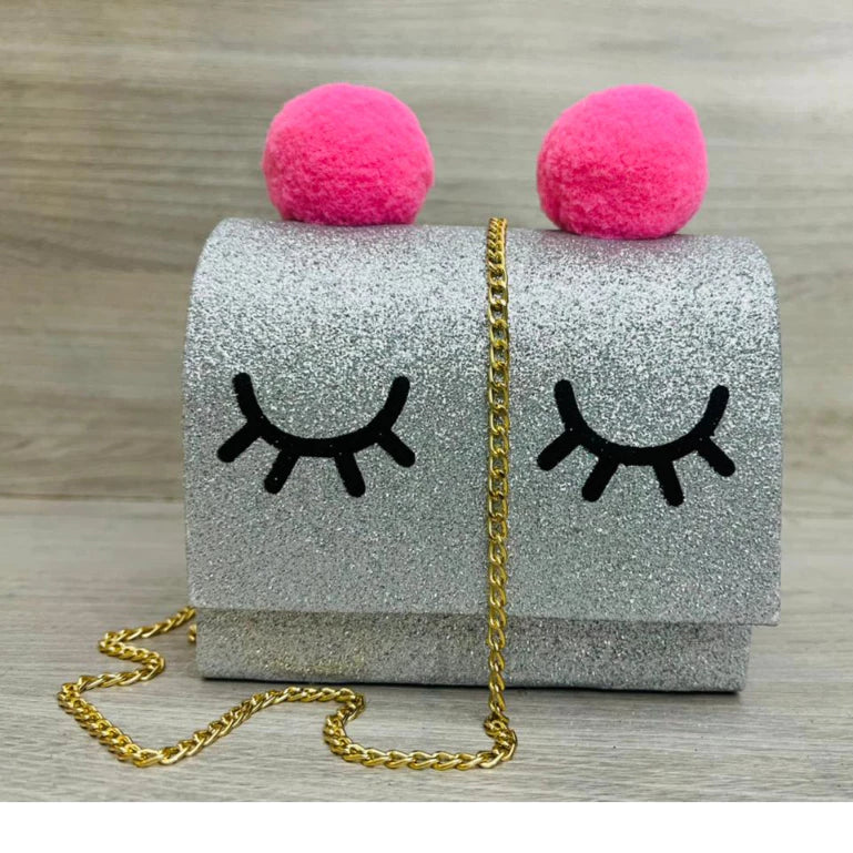 Bolsa infantil de olhinhos soninho com Pompom