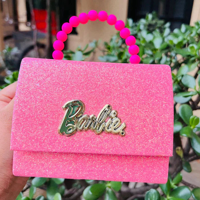 Bolsa Barbie infantil brilhosa com corrente