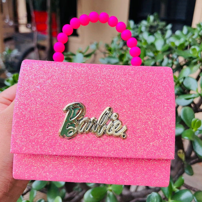 Bolsa Barbie infantil brilhosa com corrente